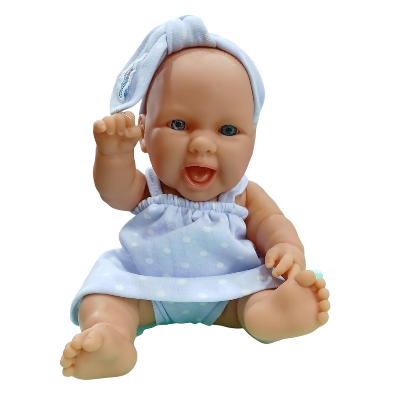 BEBE PLASTICO CON ROPITA BOLSA